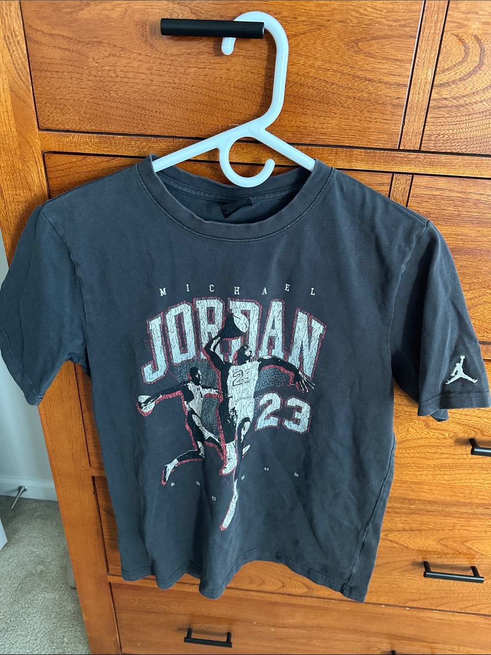 Jordan Black Graphic Kids Tee with Red & White Accents